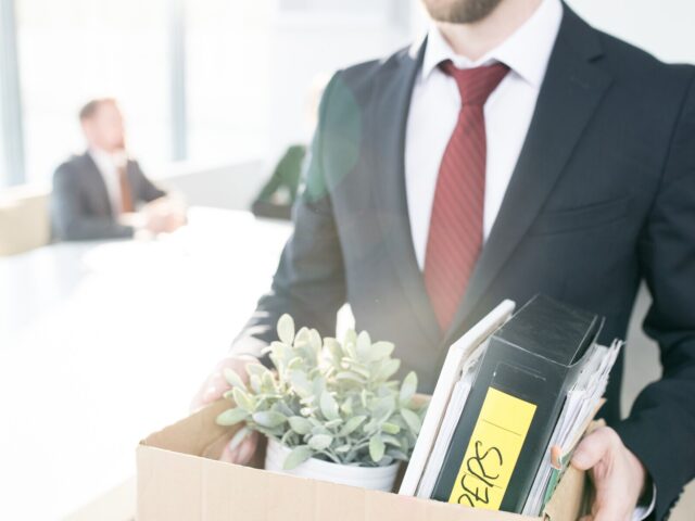 Man packs up and leaves office after being laid offjpeg 978b8d064138018a1dfad71b9882dd21