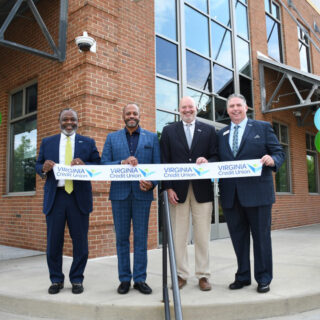 Chris Shockley (right) poses with members of the VACU board of directors at our Carytown branch opening.